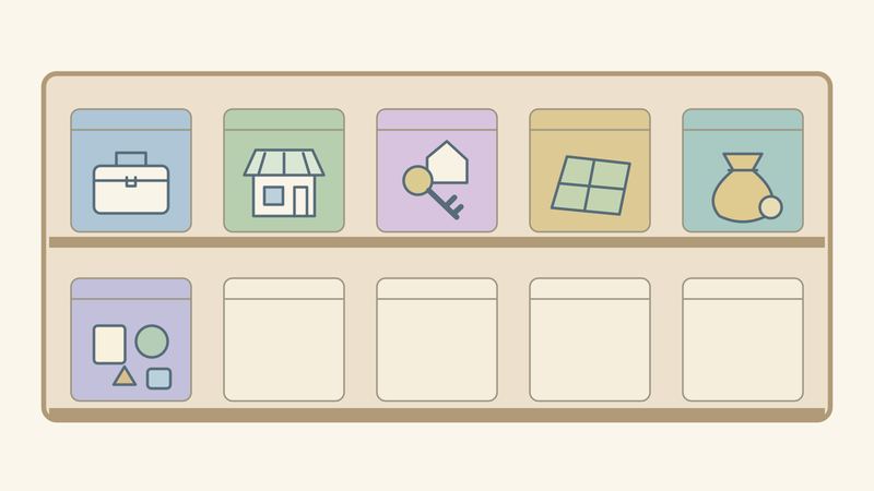 棚に並ぶ10個の箱のうち6個だけに色がつき、かばんや家など6種の絵記号が描かれている。