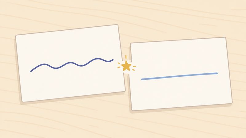 机の上の2枚のカードが端をずらして置かれ、できたすき間に小さな星印がある。