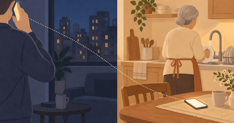 画面左は都会の部屋で人がスマホを耳に当て、右は実家の台所で人が洗い物をし、食卓の電話が光り、両者を点線がつなぐ。